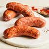 Image of Spanish Chorizo. 4 links, about 1 lb. a fresh Spanish-style sausage made with vermouth, garlic, and pimenton
