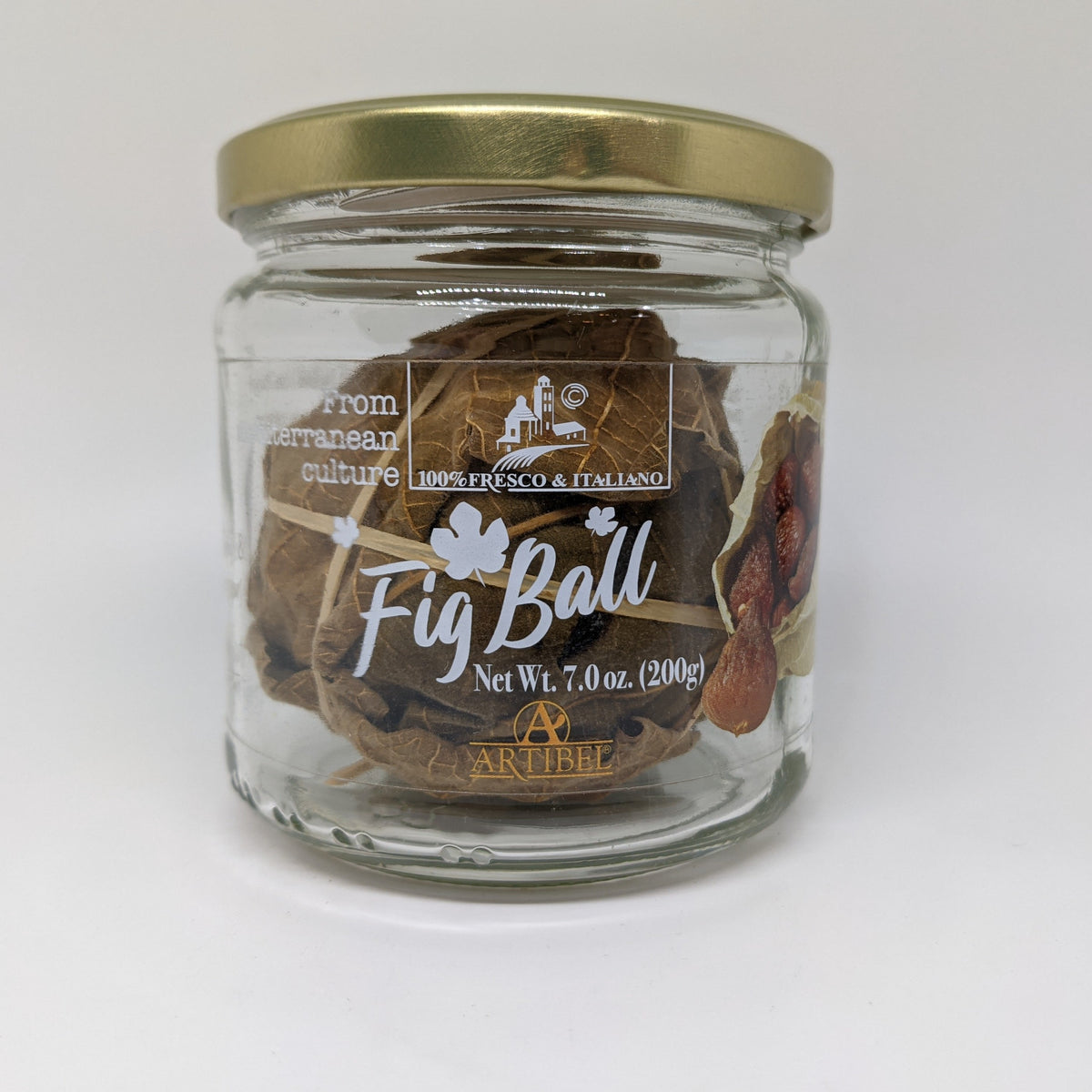 Picture of figs in a balled in leaves in a jar